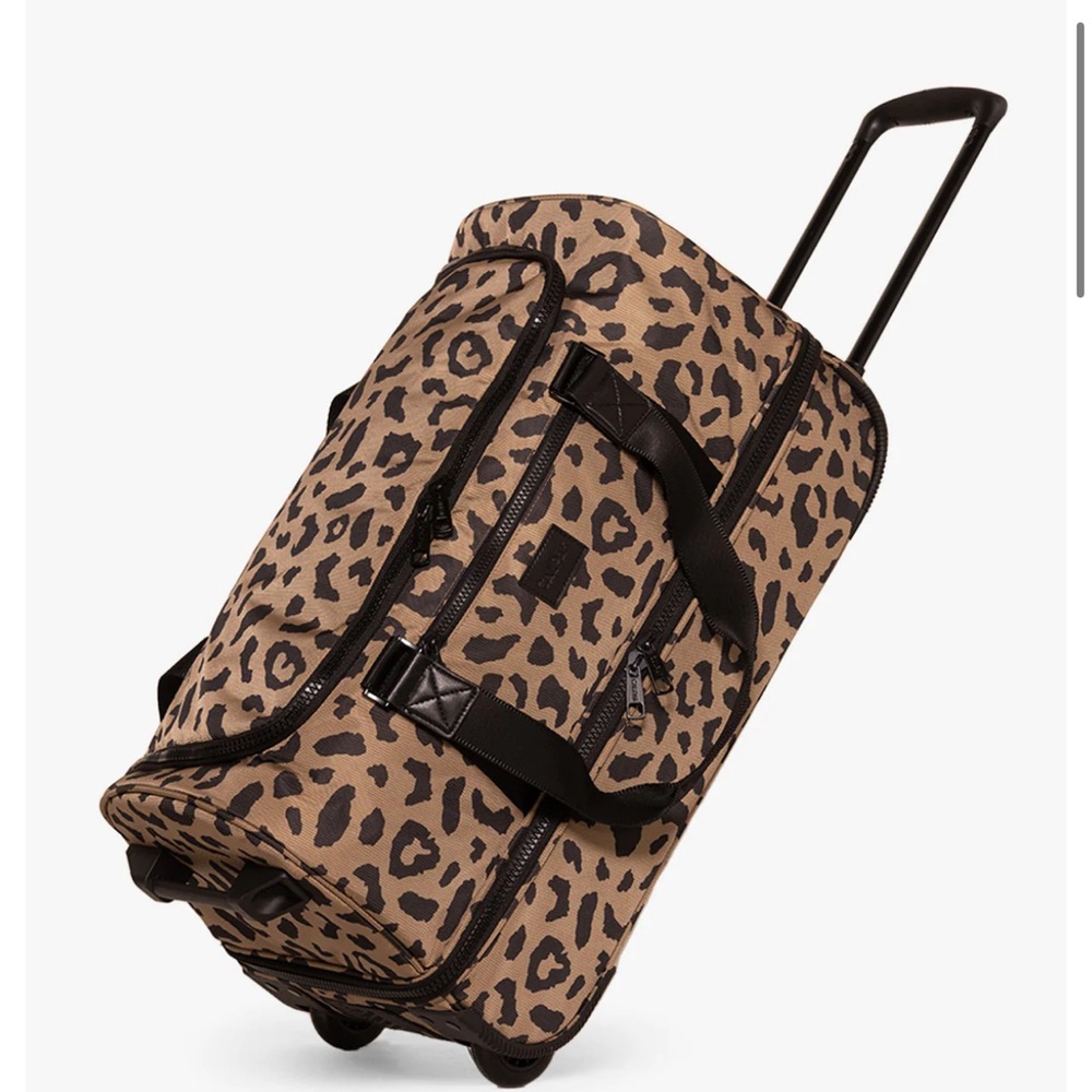 Calpak rolling duffle. Brand new with tags. Never used